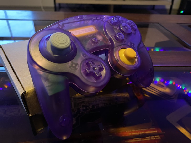 An image of a custom Atomic Purple GameCube controller