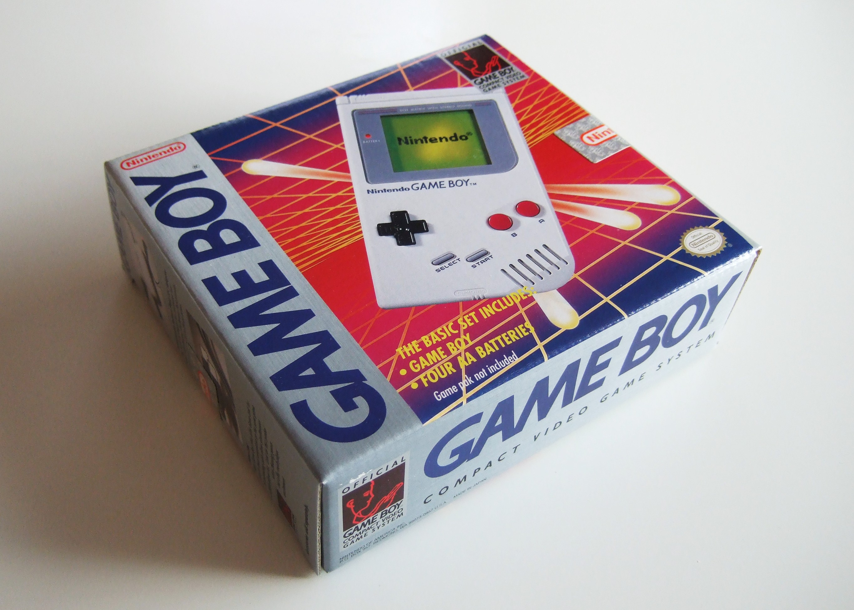 An image of an original Game Boy in its packaging